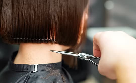 A precision bob being cut and checked for balance