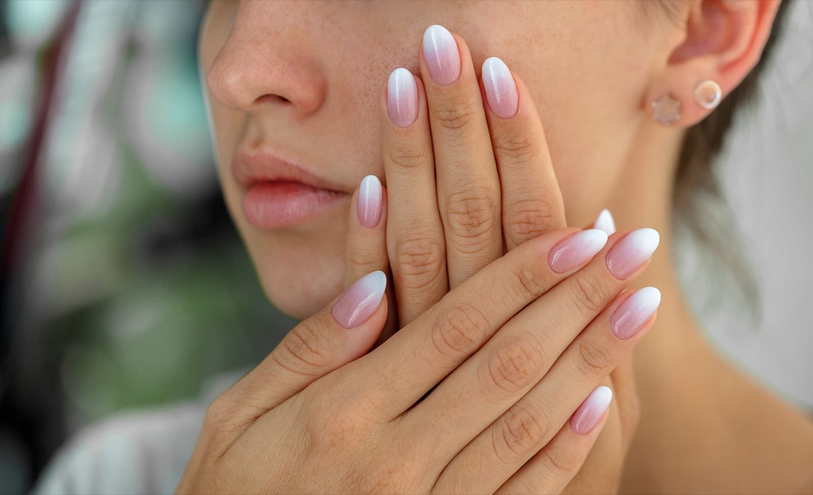 A pink and white ombre almond nail set