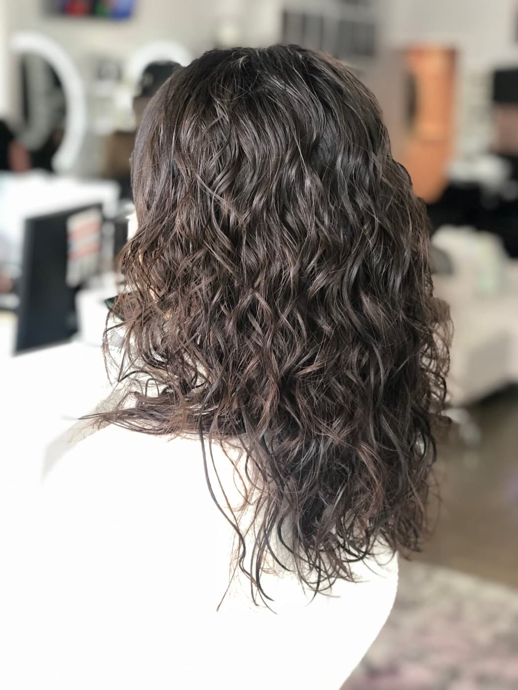 Soft, long-lasting curls finished on the salon floor at Glory